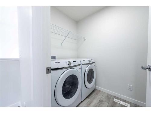 419 Savanna Way Ne, Calgary, AB - Indoor Photo Showing Laundry Room