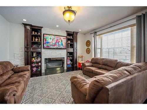 6 Taralake Cape Ne, Calgary, AB - Indoor Photo Showing Living Room With Fireplace