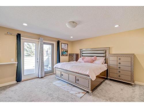 247 Pump Hill Crescent Sw, Calgary, AB - Indoor Photo Showing Bedroom