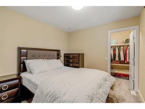 247 Pump Hill Crescent Sw, Calgary, AB - Indoor Photo Showing Bedroom