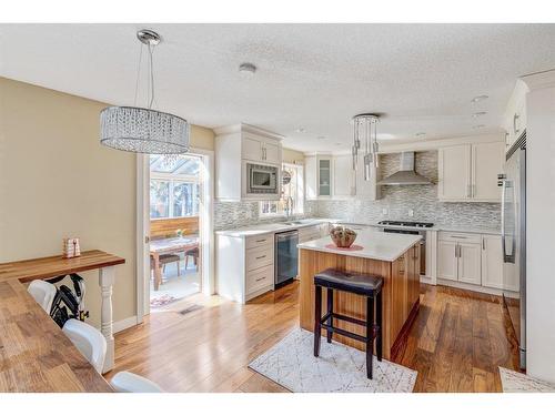 247 Pump Hill Crescent Sw, Calgary, AB - Indoor Photo Showing Kitchen With Upgraded Kitchen