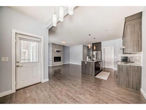 252 Nolanhurst Crescent Nw, Calgary, AB - Indoor Photo Showing Kitchen With Fireplace