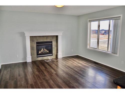 53 Saddlecrest Place Ne, Calgary, AB - Indoor Photo Showing Living Room With Fireplace