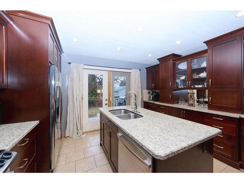 1443 Mccrimmon Drive, Carstairs, AB - Indoor Photo Showing Kitchen With Double Sink