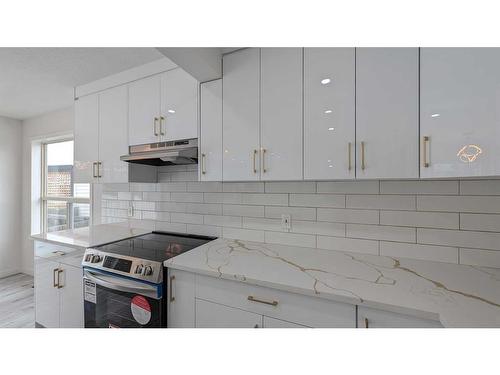102 Somercrest Circle Sw, Calgary, AB - Indoor Photo Showing Kitchen With Upgraded Kitchen