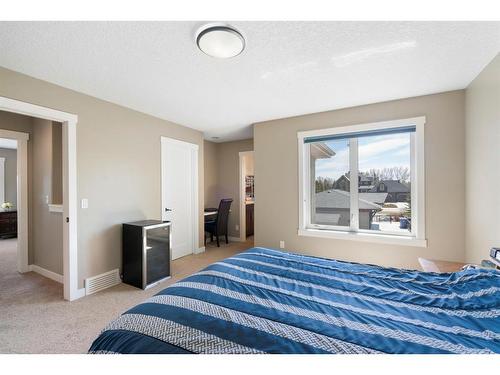 23 Watermark Road, Rural Rocky View County, AB - Indoor Photo Showing Bedroom