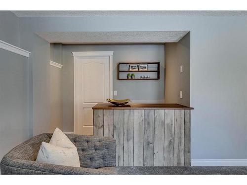 65 Sandstone Ridge Crescent, Okotoks, AB - Indoor Photo Showing Living Room