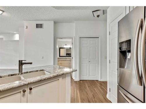 310-638 11 Avenue Sw, Calgary, AB - Indoor Photo Showing Kitchen With Double Sink