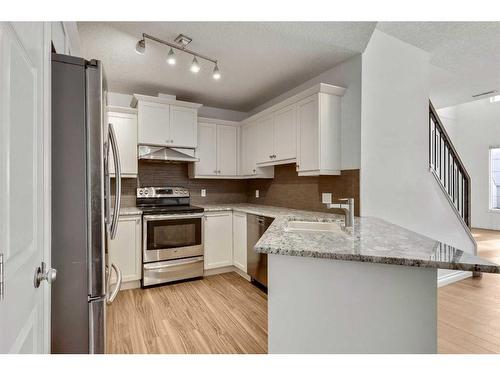 310-638 11 Avenue Sw, Calgary, AB - Indoor Photo Showing Kitchen With Stainless Steel Kitchen With Upgraded Kitchen