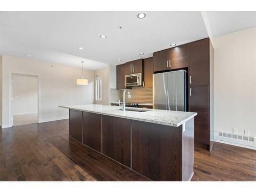 208-1730 5A Street Sw, Calgary, AB - Indoor Photo Showing Kitchen With Upgraded Kitchen