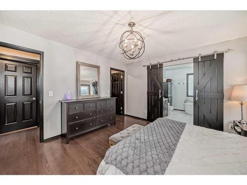 56 Mckenzie Lake Crescent Se, Calgary, AB - Indoor Photo Showing Bedroom
