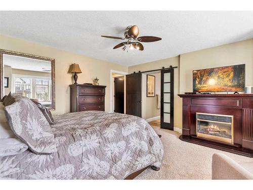 384 Coopers Terrace Sw, Airdrie, AB - Indoor Photo Showing Bedroom