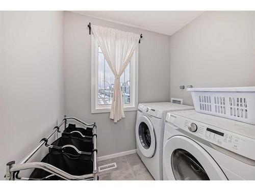 154 Yorkstone Way, Calgary, AB - Indoor Photo Showing Laundry Room
