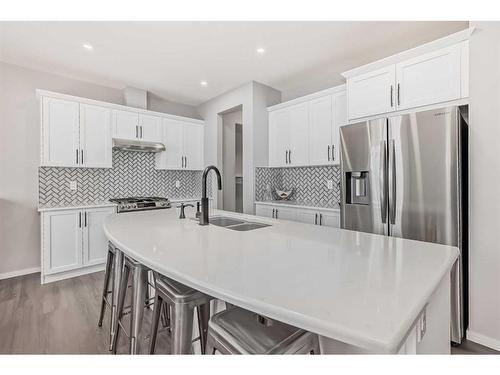 154 Yorkstone Way, Calgary, AB - Indoor Photo Showing Kitchen With Double Sink With Upgraded Kitchen
