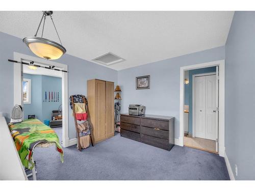 259 Taracove Place Ne, Calgary, AB - Indoor Photo Showing Bedroom