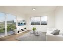 A2 209-8607-8825 52 Street, Calgary, AB  - Indoor Photo Showing Living Room 