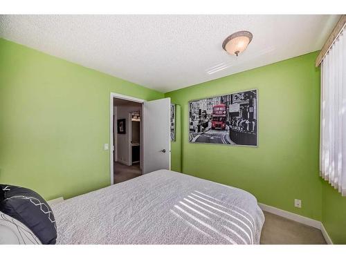 23-10457 19 Street Sw, Calgary, AB - Indoor Photo Showing Bedroom