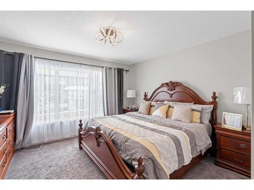 33 Legacy Woods Place Se, Calgary, AB - Indoor Photo Showing Bedroom
