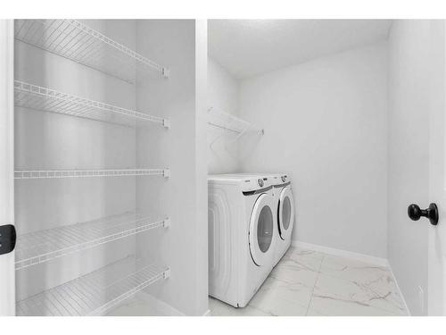 145 Herron Rise Ne, Calgary, AB - Indoor Photo Showing Laundry Room