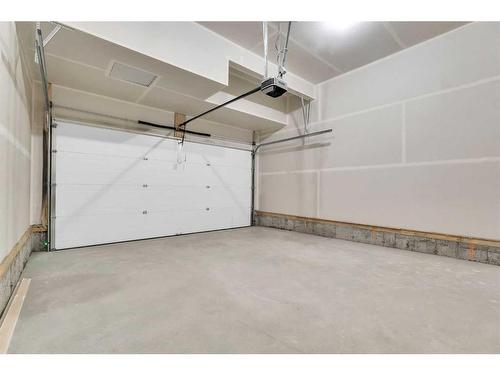 145 Herron Rise Ne, Calgary, AB - Indoor Photo Showing Garage