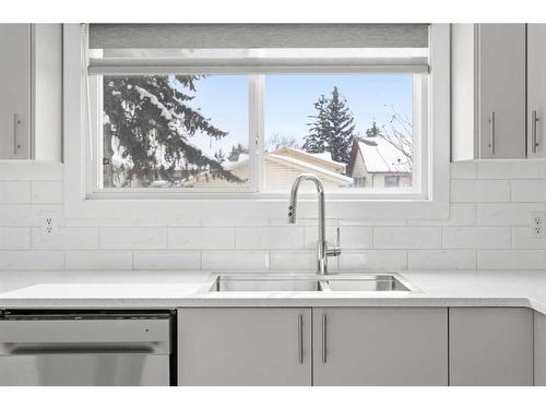 7 Whitmire Road Ne, Calgary, AB - Indoor Photo Showing Kitchen With Double Sink