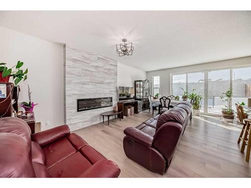 178 Aquila Way Nw, Calgary, AB - Indoor Photo Showing Living Room With Fireplace