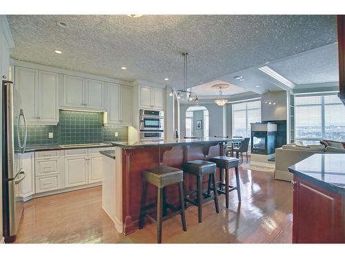 902-1726 14 Avenue Nw, Calgary, AB - Indoor Photo Showing Kitchen With Stainless Steel Kitchen With Upgraded Kitchen