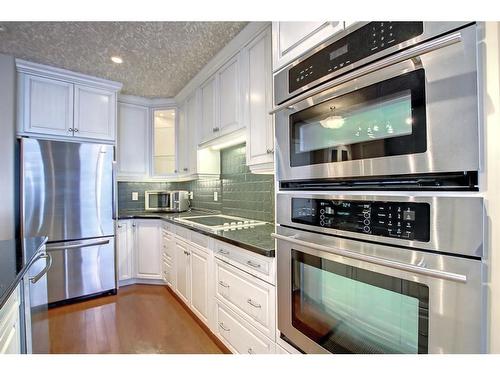 902-1726 14 Avenue Nw, Calgary, AB - Indoor Photo Showing Kitchen With Stainless Steel Kitchen With Upgraded Kitchen