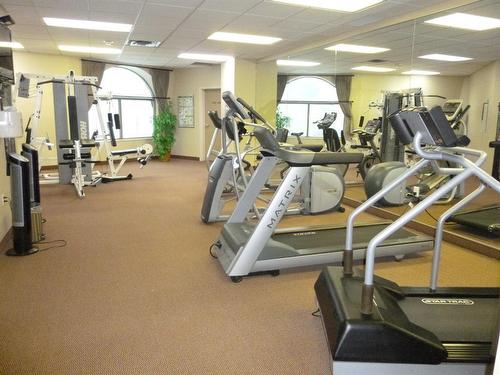 902-1726 14 Avenue Nw, Calgary, AB - Indoor Photo Showing Gym Room