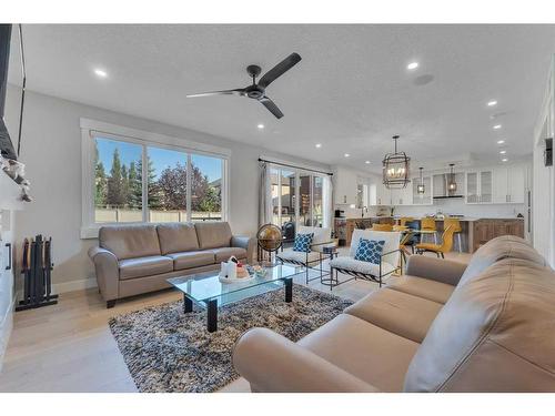 307 Stonemere Bay, Chestermere, AB - Indoor Photo Showing Living Room