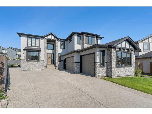 307 Stonemere Bay, Chestermere, AB - Outdoor With Facade