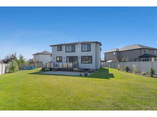 307 Stonemere Bay, Chestermere, AB - Outdoor With Deck Patio Veranda With Backyard