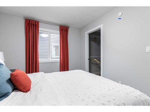 86 Saddlebred Place, Cochrane, AB - Indoor Photo Showing Bedroom