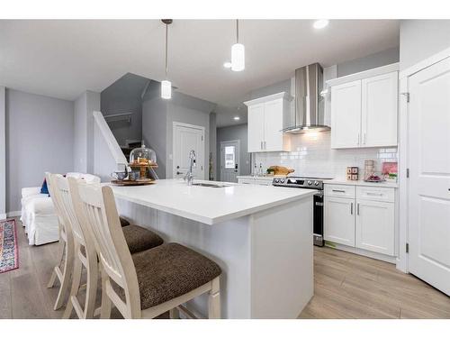 86 Saddlebred Place, Cochrane, AB - Indoor Photo Showing Kitchen With Upgraded Kitchen