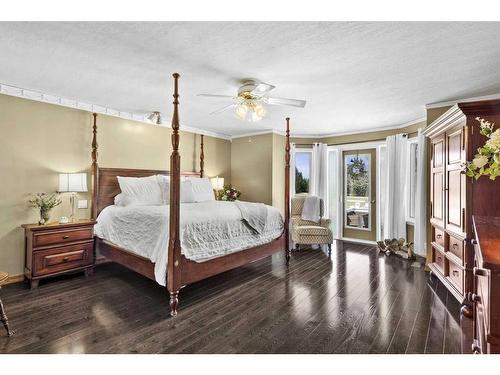 515 Bearspaw Village Ridge, Rural Rocky View County, AB - Indoor Photo Showing Bedroom