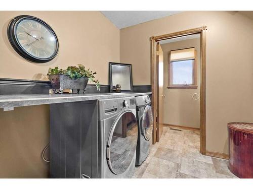 515 Bearspaw Village Ridge, Rural Rocky View County, AB - Indoor Photo Showing Laundry Room