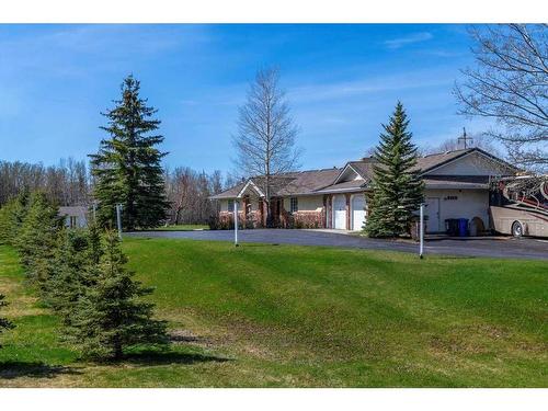 515 Bearspaw Village Ridge, Rural Rocky View County, AB - Outdoor With Facade
