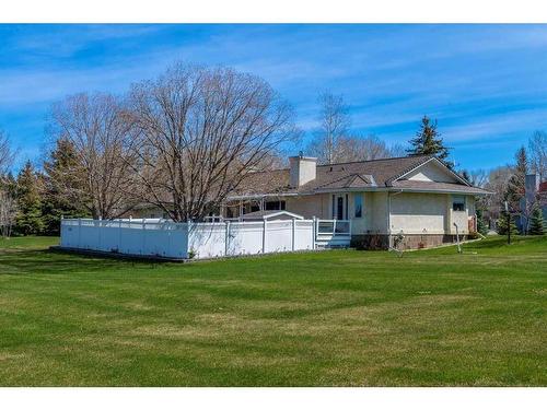 515 Bearspaw Village Ridge, Rural Rocky View County, AB - Outdoor With Above Ground Pool