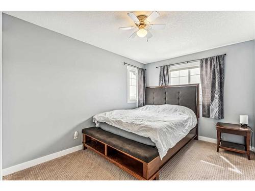 159 Evanscove Heights Nw, Calgary, AB - Indoor Photo Showing Bedroom
