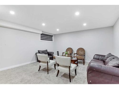 37 Everwillow Park Sw, Calgary, AB - Indoor Photo Showing Basement