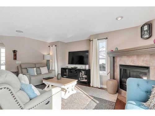 37 Everwillow Park Sw, Calgary, AB - Indoor Photo Showing Living Room With Fireplace