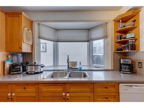 2235 6 Avenue Nw, Calgary, AB - Indoor Photo Showing Kitchen With Double Sink