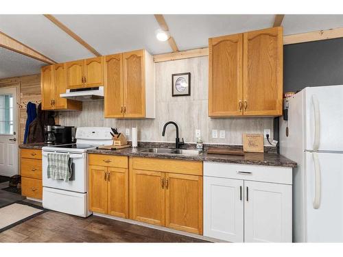 31138 Highway 791, Rural Mountain View County, AB - Indoor Photo Showing Kitchen With Double Sink