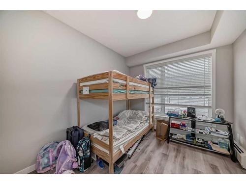 207-200 Shawnee Square Sw, Calgary, AB - Indoor Photo Showing Bedroom