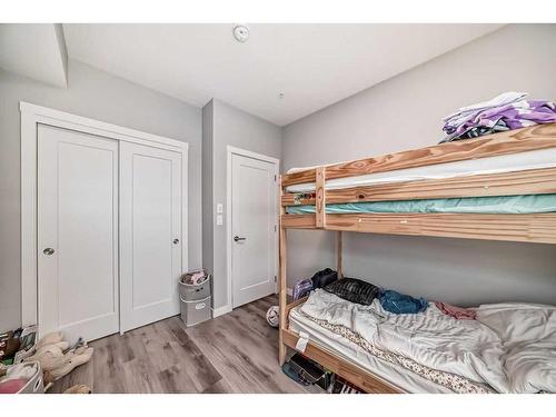 207-200 Shawnee Square Sw, Calgary, AB - Indoor Photo Showing Bedroom