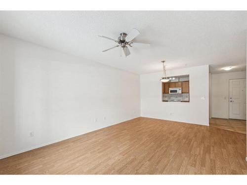 2103-928 Arbour Lake Road Nw, Calgary, AB - Indoor Photo Showing Other Room