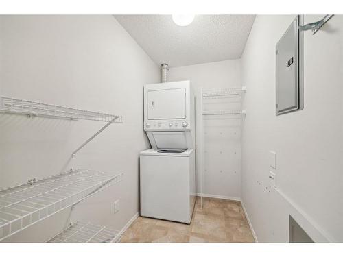 2103-928 Arbour Lake Road Nw, Calgary, AB - Indoor Photo Showing Laundry Room
