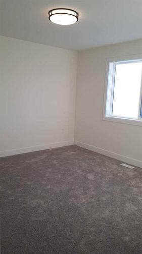 815 Mandalay Link, Carstairs, AB - Indoor Photo Showing Other Room