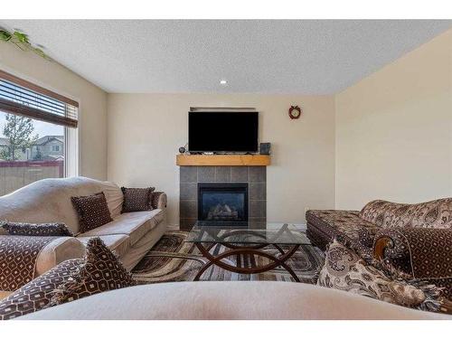 159 Taralake Way Ne, Calgary, AB - Indoor Photo Showing Living Room With Fireplace