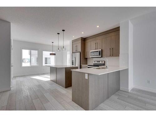 801-335 Creekside Boulevard Sw, Calgary, AB - Indoor Photo Showing Kitchen With Upgraded Kitchen